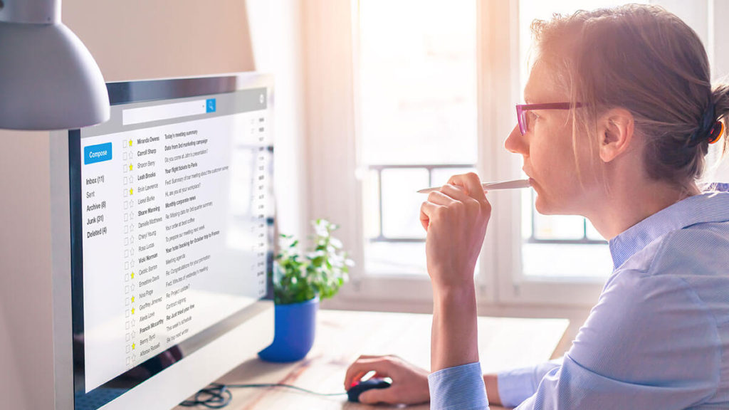 Lady having a great time looking over emails